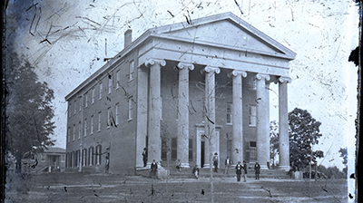 Lyceum Building, old Steward's Hall in the background. Photo dates between 1856-1861.